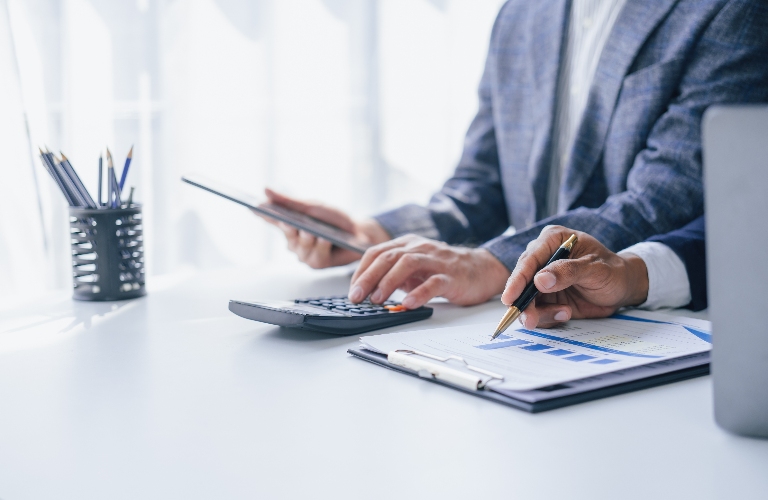 Lawyer is working with documents and consulting client