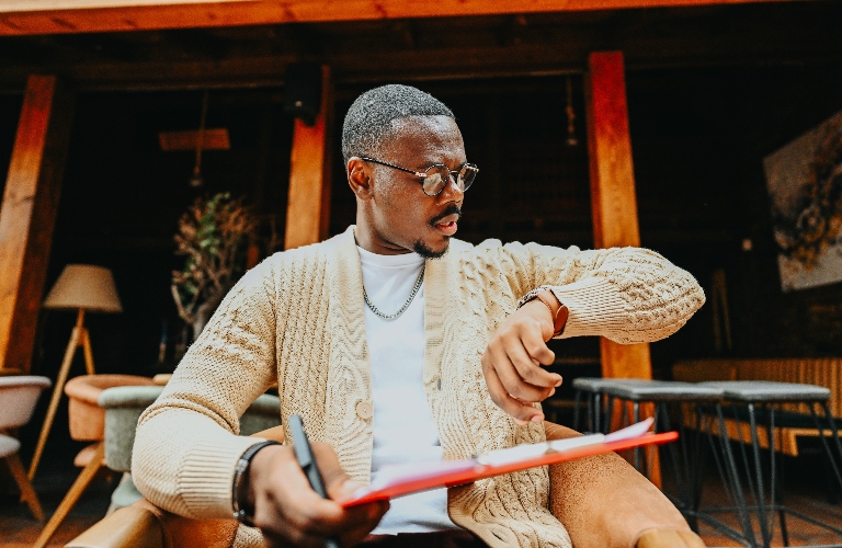 man checking his watch