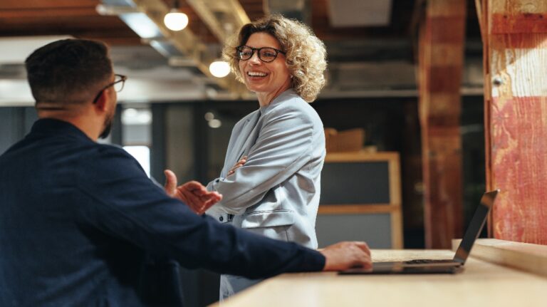 two professionals having a conversation